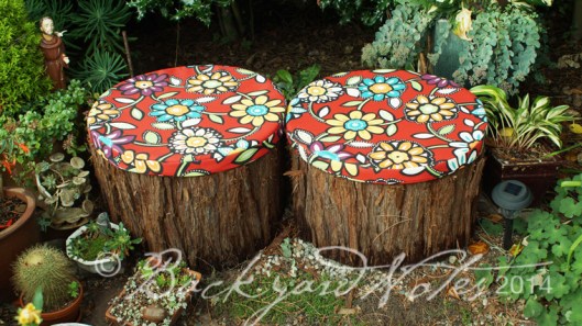 Weather resistant Sunbrella fabric. Only one drawback–they are under the canopy of a large pine and susceptible to pitch drips.